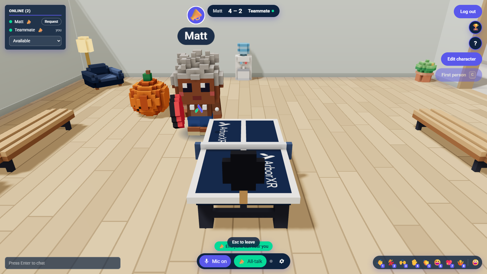 What a desktop player sees: me in VR at the far end of the table, holding my paddle